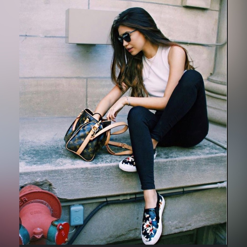 GIVENCHY
Leather Floral Print Sneakers